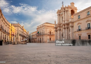 a large building with a clock tower in the middle of it