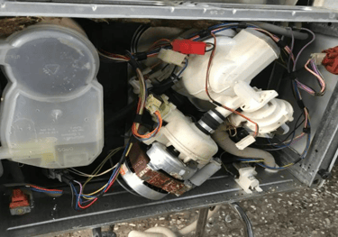 a pictures shows the internal component of a dishwasher