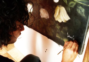 a man is painting a picture
