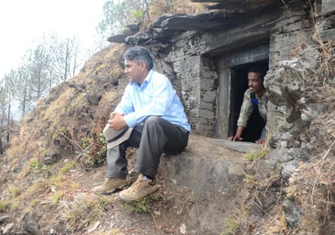 rohit thapliyal with naveen thapliyal in village punchur  in front of a cave called 'gumpha ki darr.