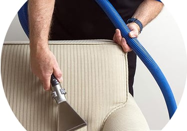 a man cleaning a couch with a vacuum galaxy Egypt