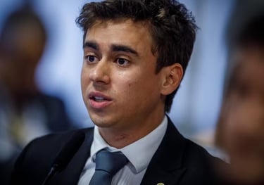 a man in a suit and tie with a microphone