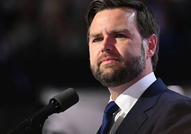 a man in a suit and tie is standing in front of a microphone