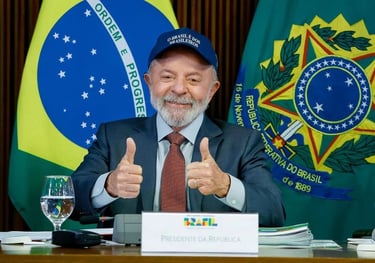 a man in a suit and tie is giving thumbs up