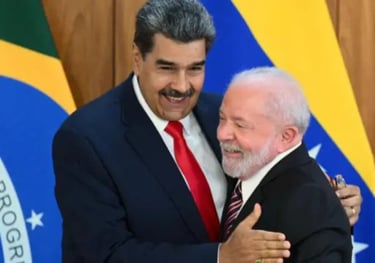 a man in a suit and tie is hugging a man in a suit