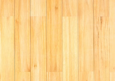 sample of a vinyl floor with light brown wood decor