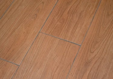 sample of laminate floor with brown wood decor