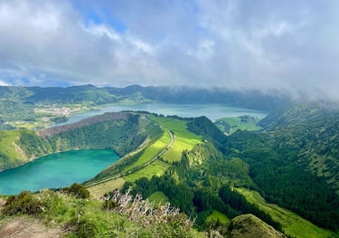 a view of a lake and mountains in the distance