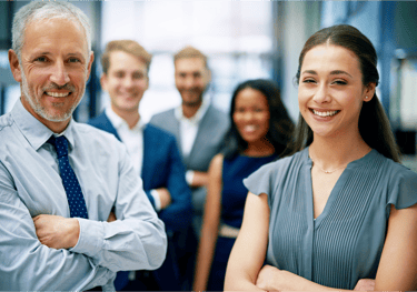 a man and woman standing in front of a group of people