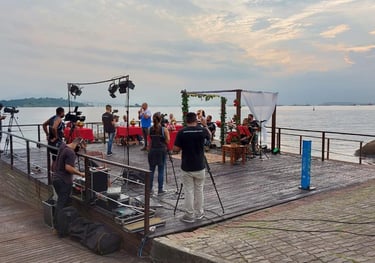 a group of people standing on a pier