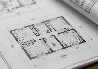 A close-up of high-quality architectural blueprints for a North American / US multifamily project. Professional Grey lines on Clean Off-white paper.