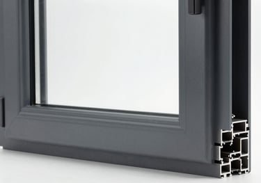 Studio photography of a premium anthracite gray aluminum window frame with triple glazing, white studio background, clean lighting.