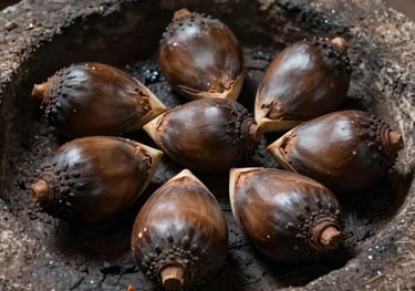 A close-up of artisanal agave hearts, or pi1as, being traditionaly cooked in a stone pit, with soft light and deep bronze shadows. Mexican / Latin American craftsmanship.