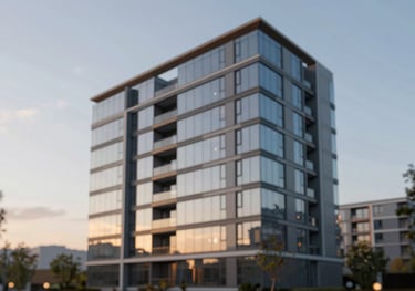 Exterior of a modern residential glass building at sunset, highlighting sleek architectural lines and premium construction quality.