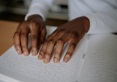a person's hands on a book