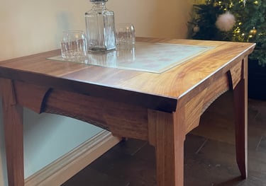 An oak coffee table with chess board inlay