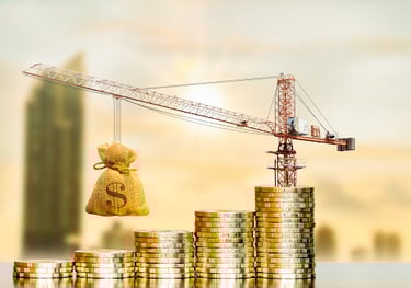a craned over a pile of coins with a crane in the background
