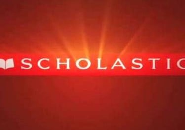 a red background with the words scholastic