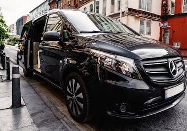 a van parked on the side of a street