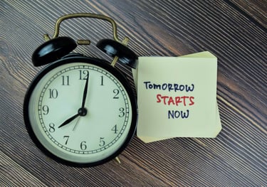 a clock with a notepad attached to it