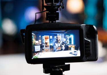 a video camera and a video camera on a tripod