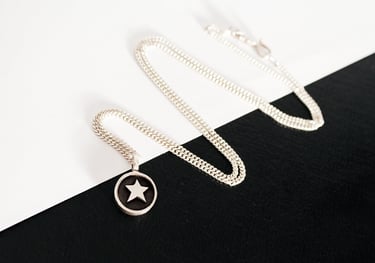 Silver necklace handmade by Frankie Ruins