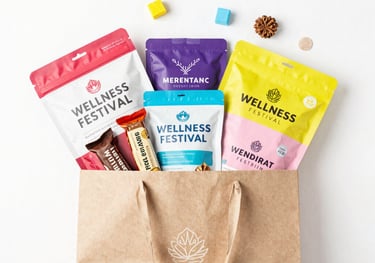 Vibrant vendor booth with wellness products displayed under a sunny canopy at Memory Mall.