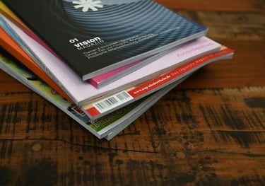 Stack of magazines representing editorial and publishing licensing opportunities for Julie Diehl Art