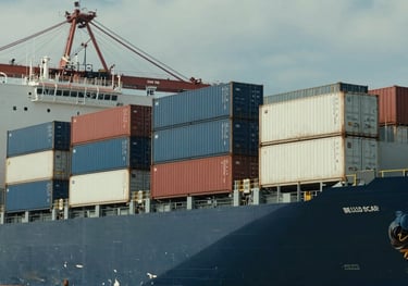 Large cargo ship at a North American / US port, focus on refrigerated containers (reefers) being loaded, daylight, cinematic composition.