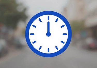 Minimalist clock icon in Royal Blue (#005EB8), with a clean and modern design style.
