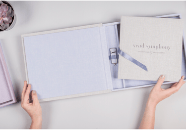 quinceanera album, a person holding a photo book