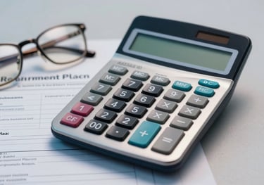 A close-up of a professional calculator, a pair of glasses, and a retirement plan document on a clean, light gray surface with soft blue lighting.