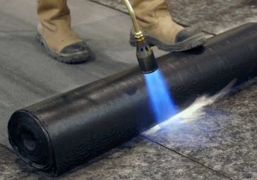 Εφαρμογή ασφαλτοπάνου σε οδόστρωμα