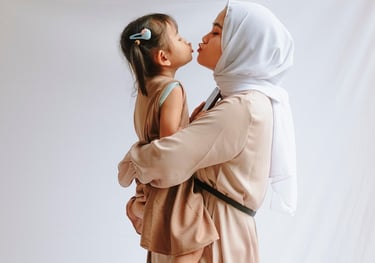 Smiling mom relaxing with baby