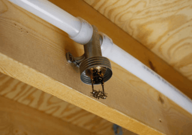 a pipe pipe with a pipe sticking out of it