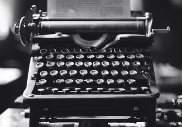 Black and white image of an old vintage typing machine