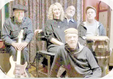 Faded photo of five-piece band relaxing