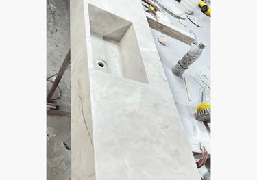 <img src="http://googleusercontent.com/file_content/0" alt="Lavatório de banheiro em fabricação, mat