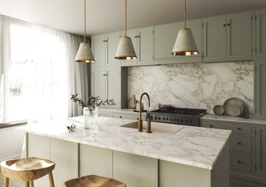 a kitchen with a marble counter top and a marble counter top