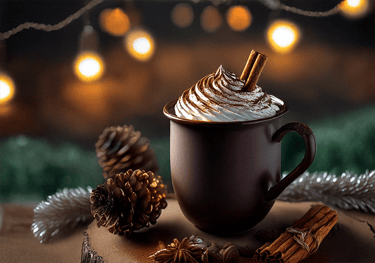 "Una taza de café con crema batida y canela."