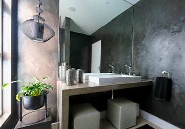 Graphite SatinCrete wall finish by Cemcrete — refined cement surface providing a polished, contemporary look
