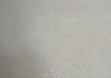 Designer laminate flooring installed by Tswanacrete Botswana for high-end interiors, delivering elegance and long-lasting