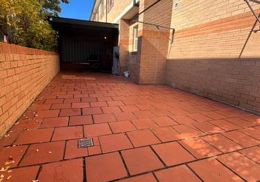 Courtyard renovation with timber-look decking tiles in Sydney