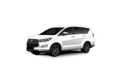 a white Toyota Innova car parked on a white background