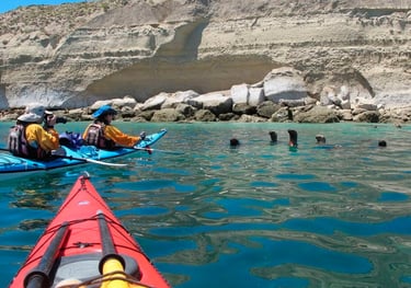 a person in a kayak kayak kayak in the water
