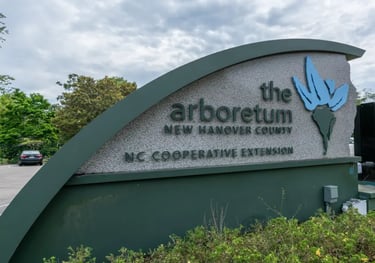 The Arboretum entrance sign for New Hanover County and NC Cooperative Extension.