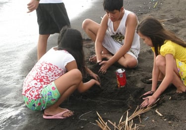 children making sand castle