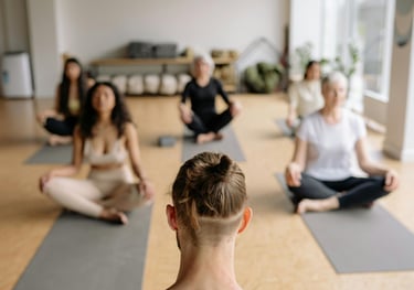 a man and woman doing yoga together