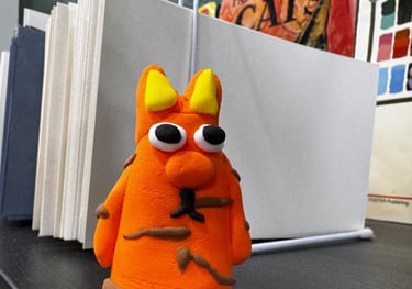 A fun looking creature made from air dry clay.