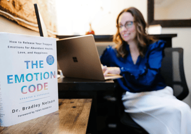 an Emotion code counselor on a video call